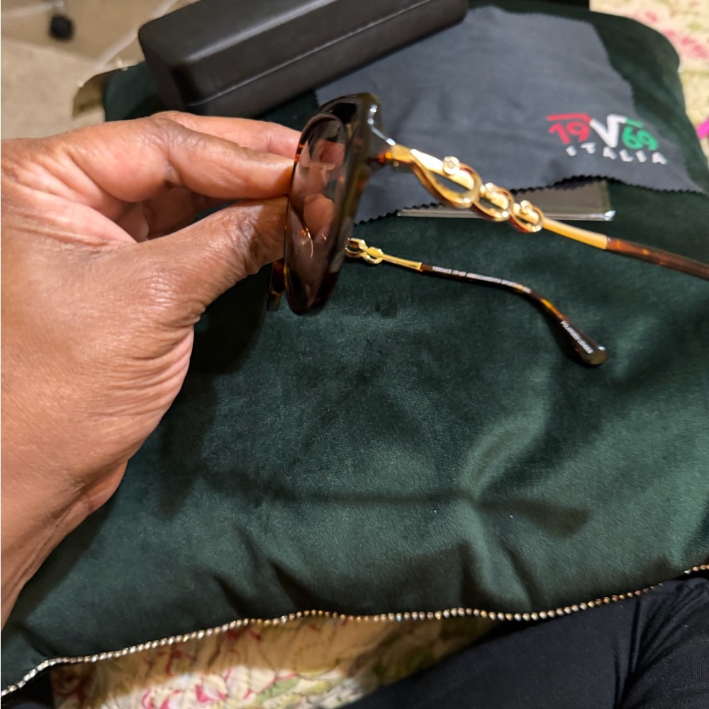 brand new female Versace glasses and case and also has dust cloth in box-
